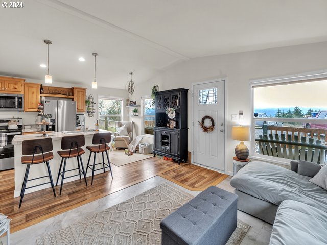22575 Business 18 Willamina, OR 97396 - Photo 6 of 24 a living room with furniture and a large window