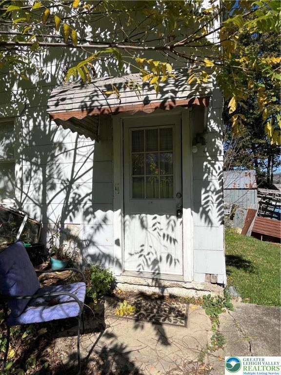 1239 4th Street Slatington, PA 18080 - Photo 14 of 17 a view of a chair and table in backyard