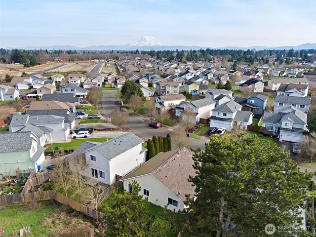 an aerial view of a city with lots of residential buildings