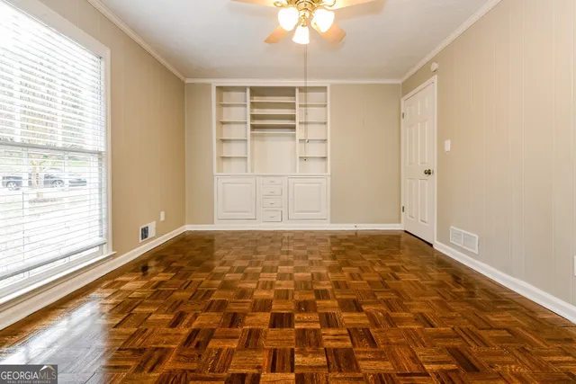 a view of an empty room and window