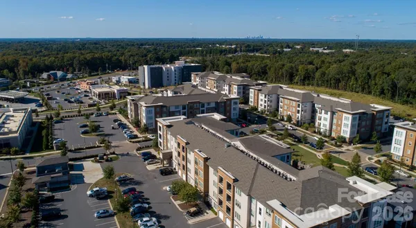 an aerial view of a city with lots of residential buildings