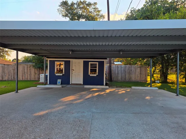 a view of a house with a street
