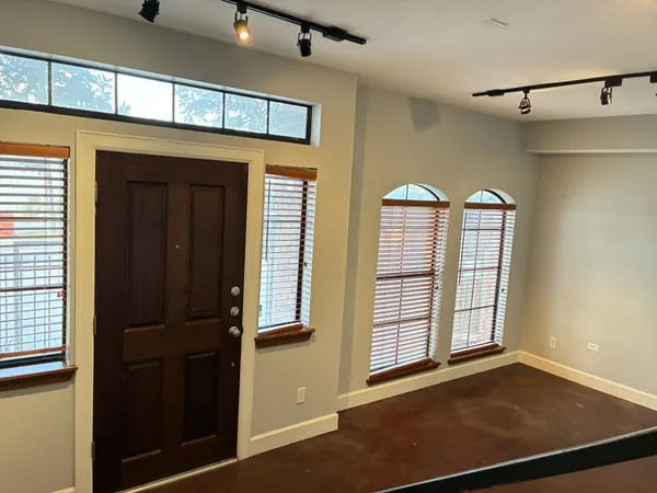 an empty room with windows
