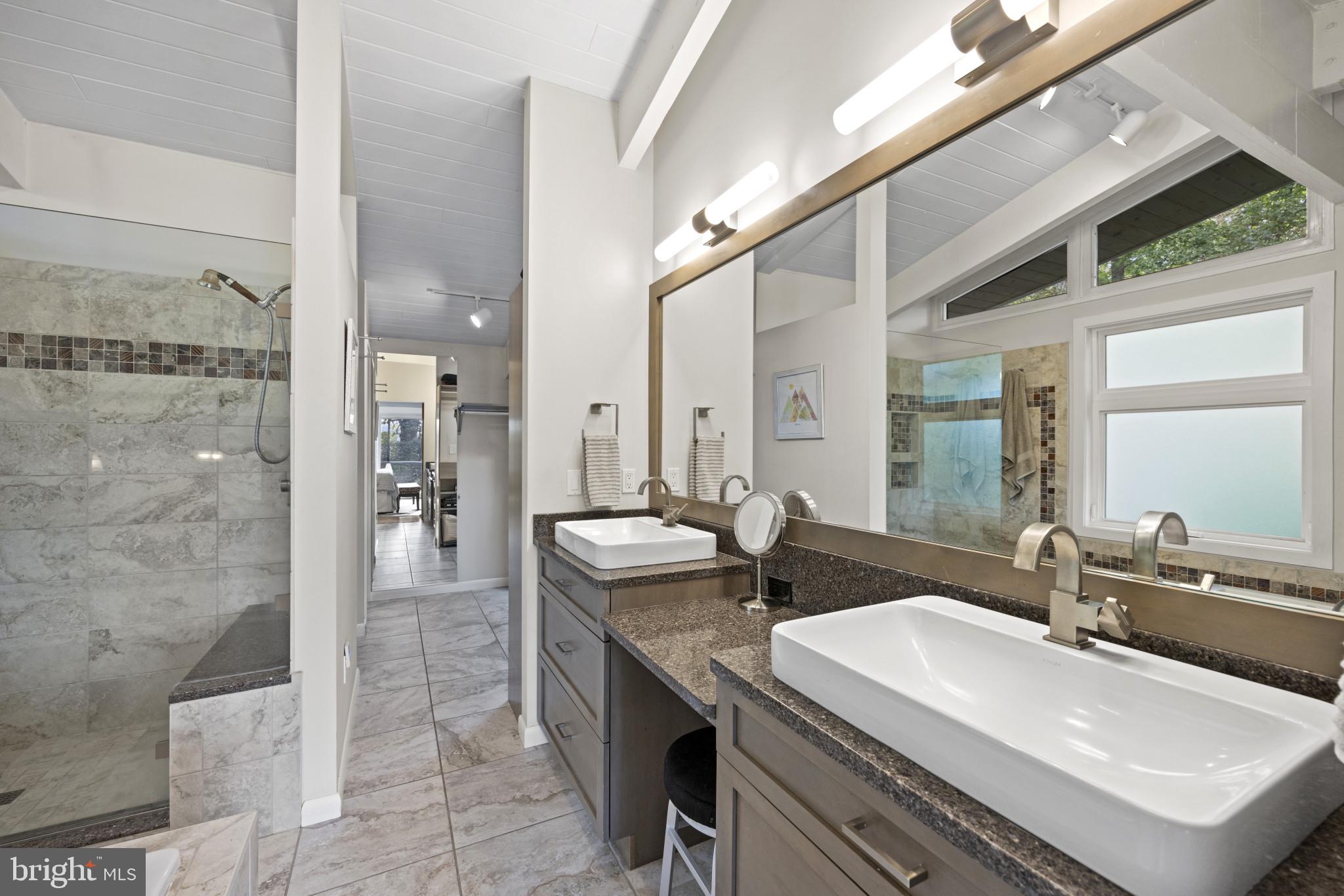 103 Fogle Drive Annapolis, MD 21403 - Photo 14 of 37 a bathroom with a sink and a mirror