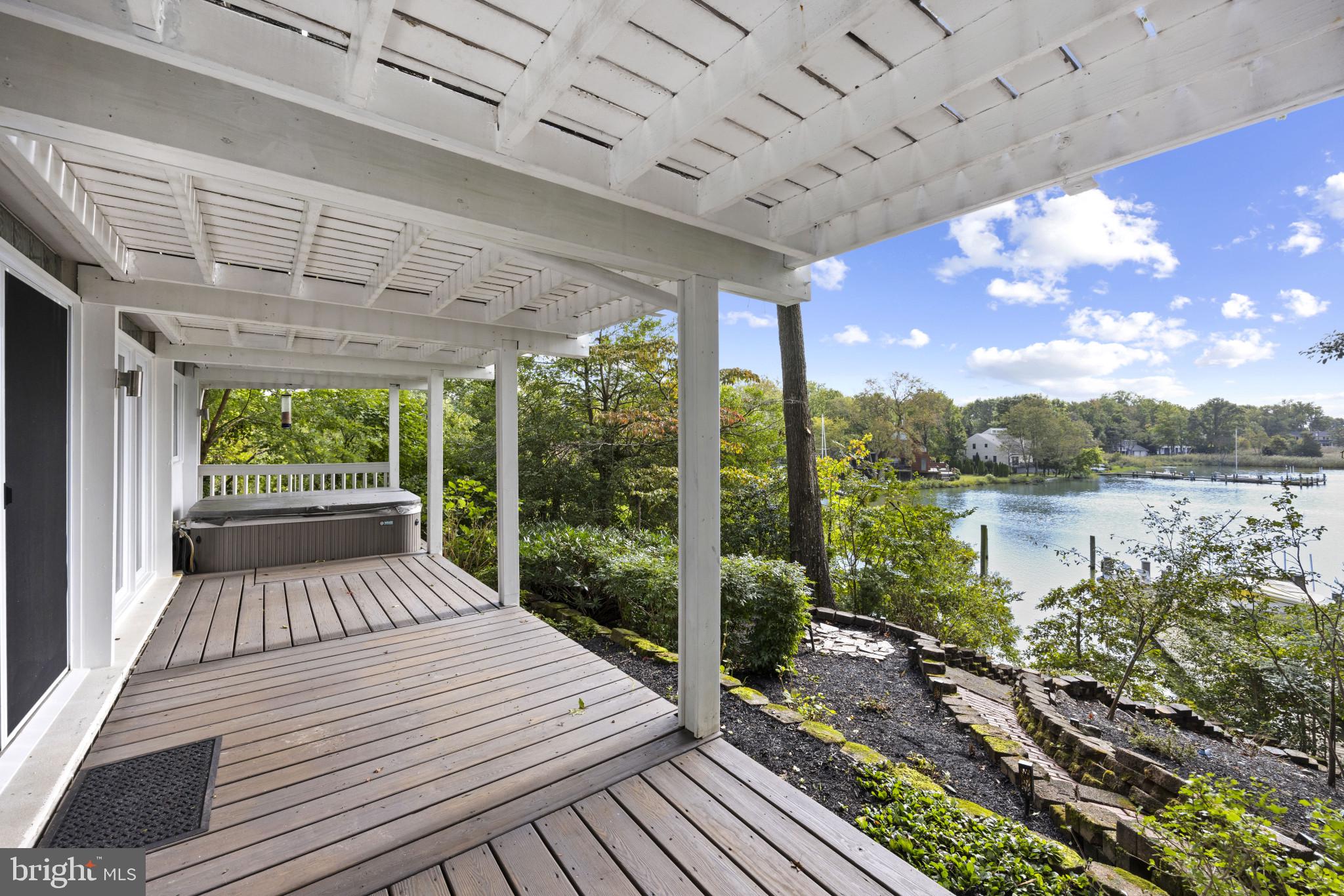 103 Fogle Drive Annapolis, MD 21403 - Photo 19 of 37 a view of a patio with wooden floor and iron stairs