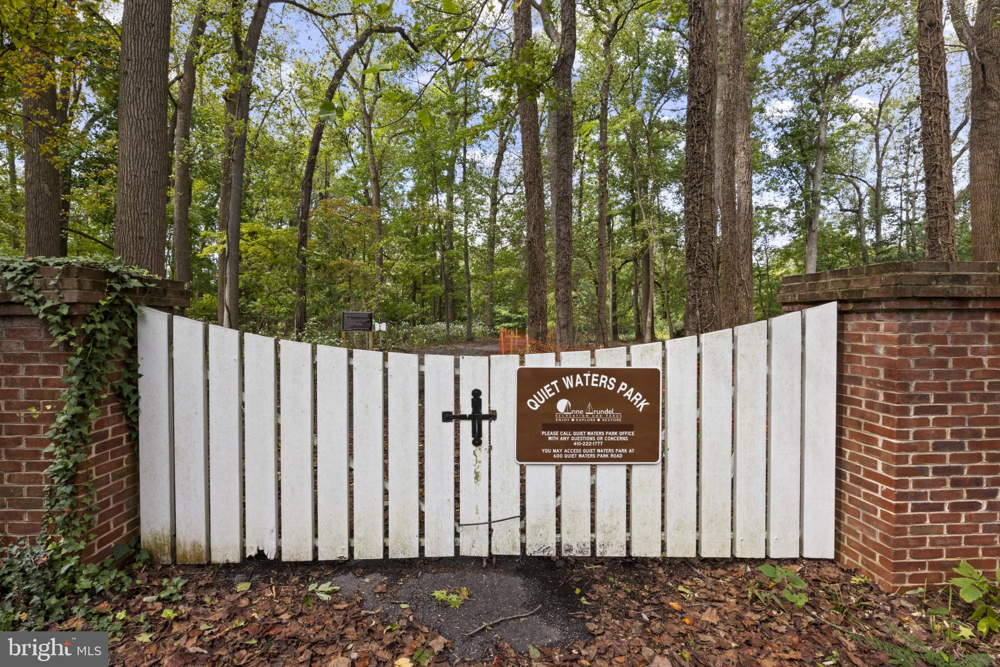 103 Fogle Drive Annapolis, MD 21403 - Photo 36 of 37 a view of a pathway of a house with wooden fence
