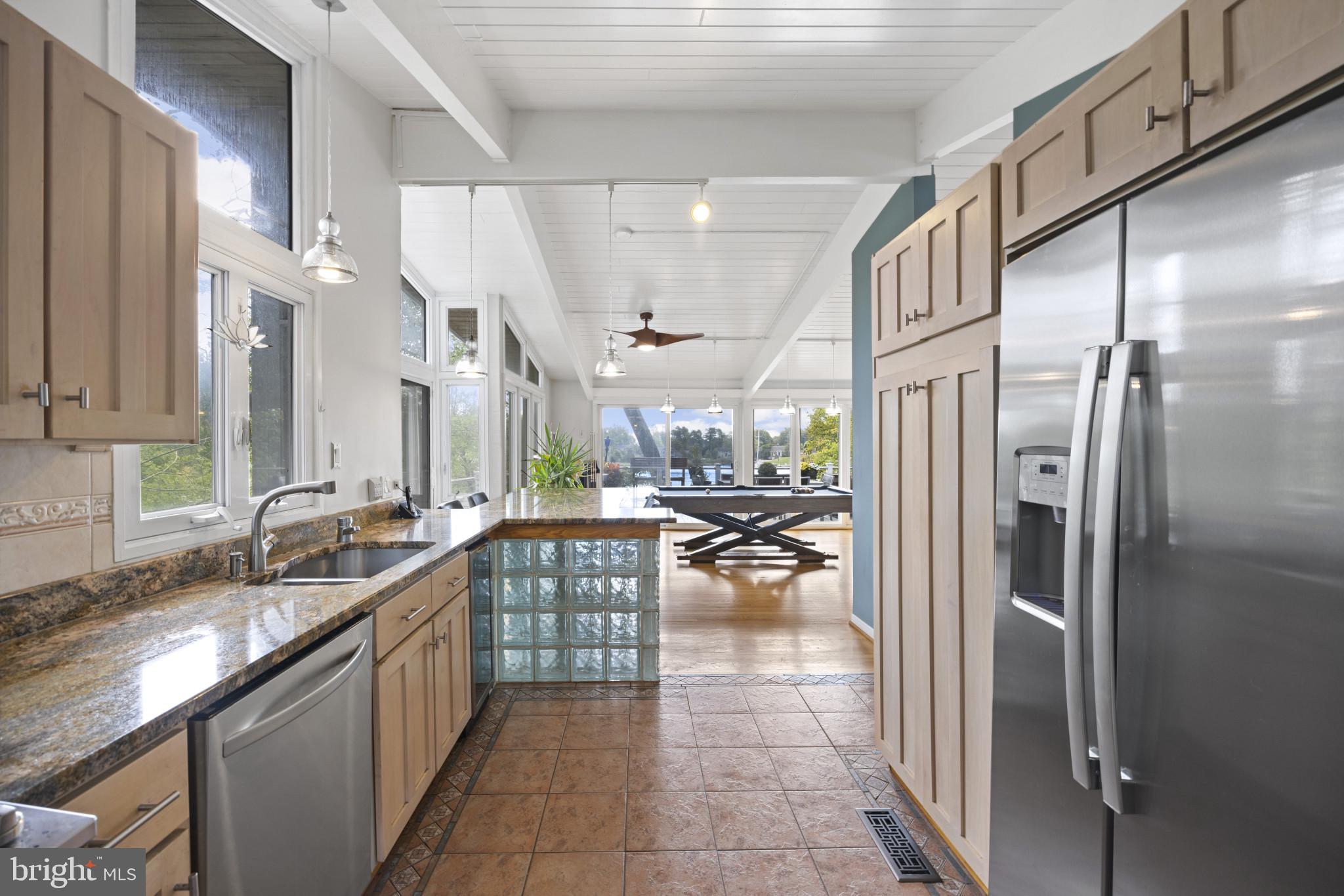 103 Fogle Drive Annapolis, MD 21403 - Photo 8 of 37 a kitchen with stainless steel appliances granite countertop a refrigerator and a sink
