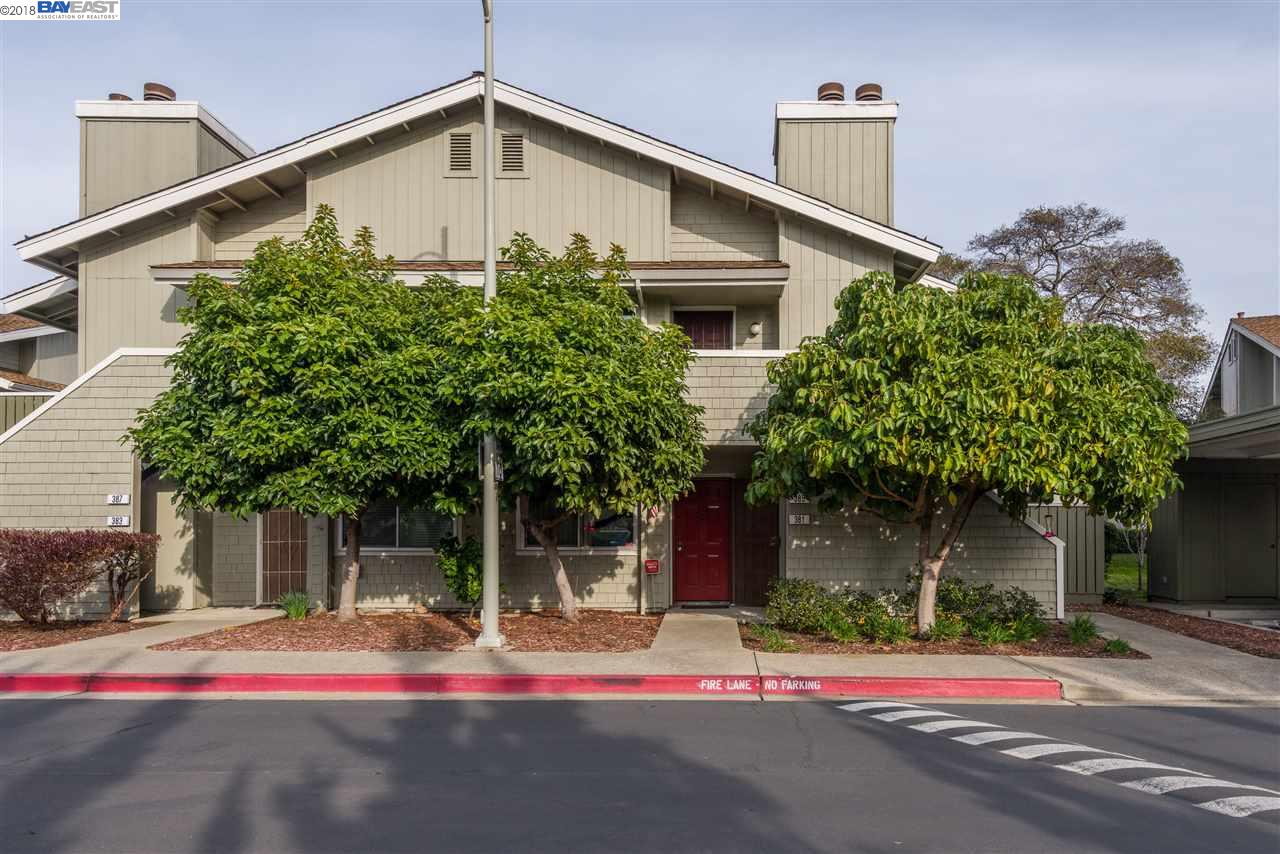 381 Caliente Circle San Leandro, CA 94578 - Photo 1 of 1 a white house with a tree in front of it