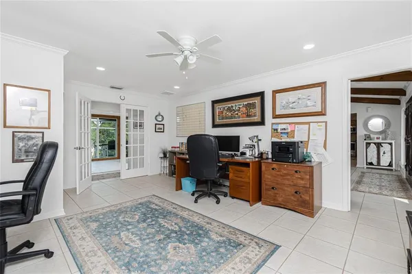 a view of a workspace with furniture and a livingroom