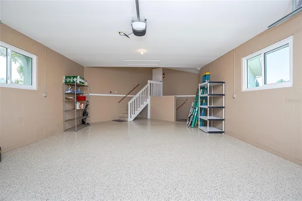 a view of room with furniture and window
