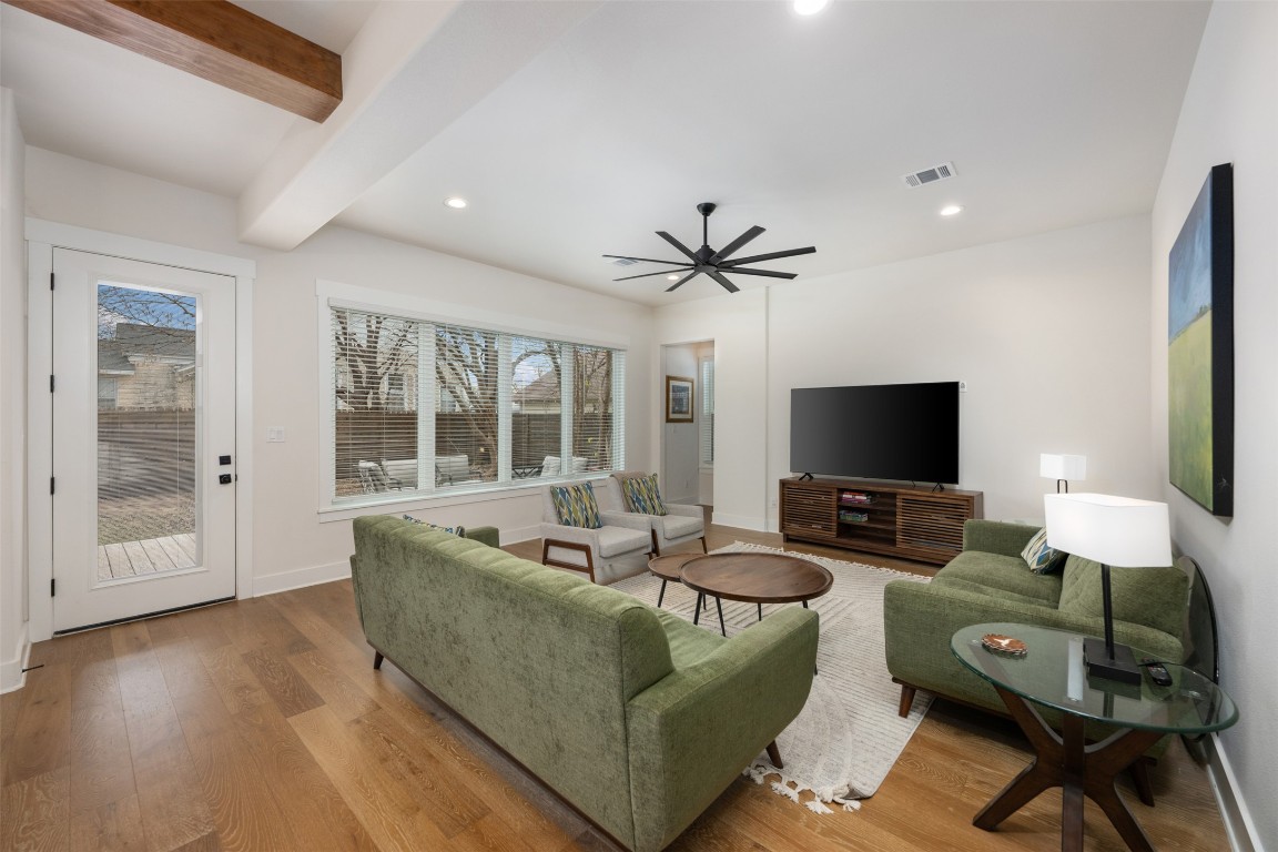 510 East 7th Street Georgetown, TX 78626 - Photo 18 of 40 a living room with furniture and a flat screen tv
