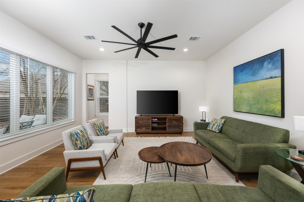 510 East 7th Street Georgetown, TX 78626 - Photo 19 of 40 a living room with furniture and a flat screen tv