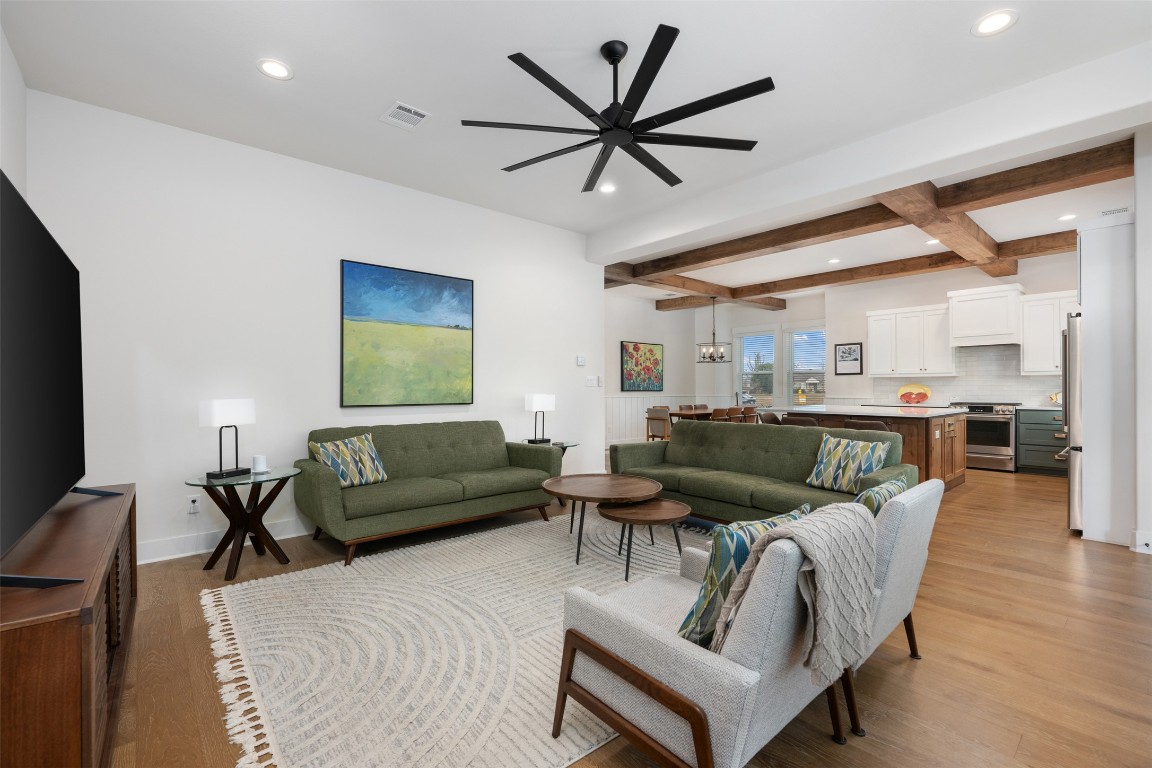 510 East 7th Street Georgetown, TX 78626 - Photo 21 of 40 a living room with furniture and a flat screen tv