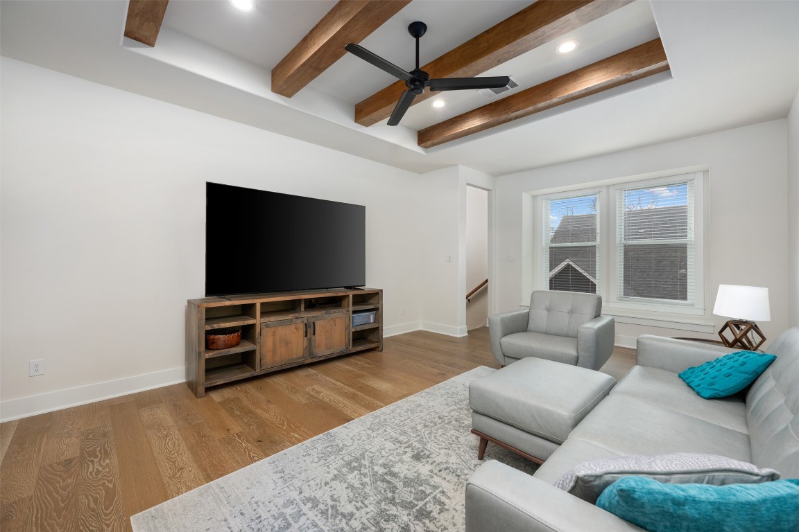 510 East 7th Street Georgetown, TX 78626 - Photo 24 of 40 a living room with furniture and a flat screen tv