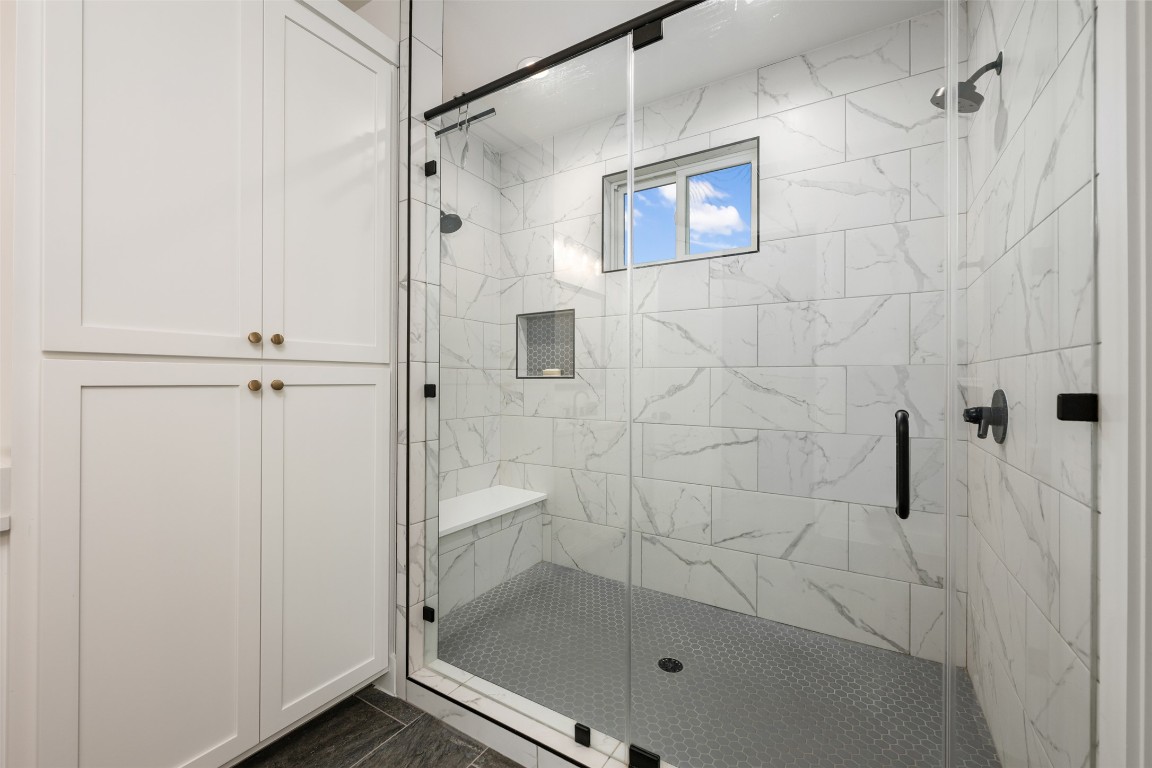 510 East 7th Street Georgetown, TX 78626 - Photo 30 of 40 a bathroom with a shower and a toilet