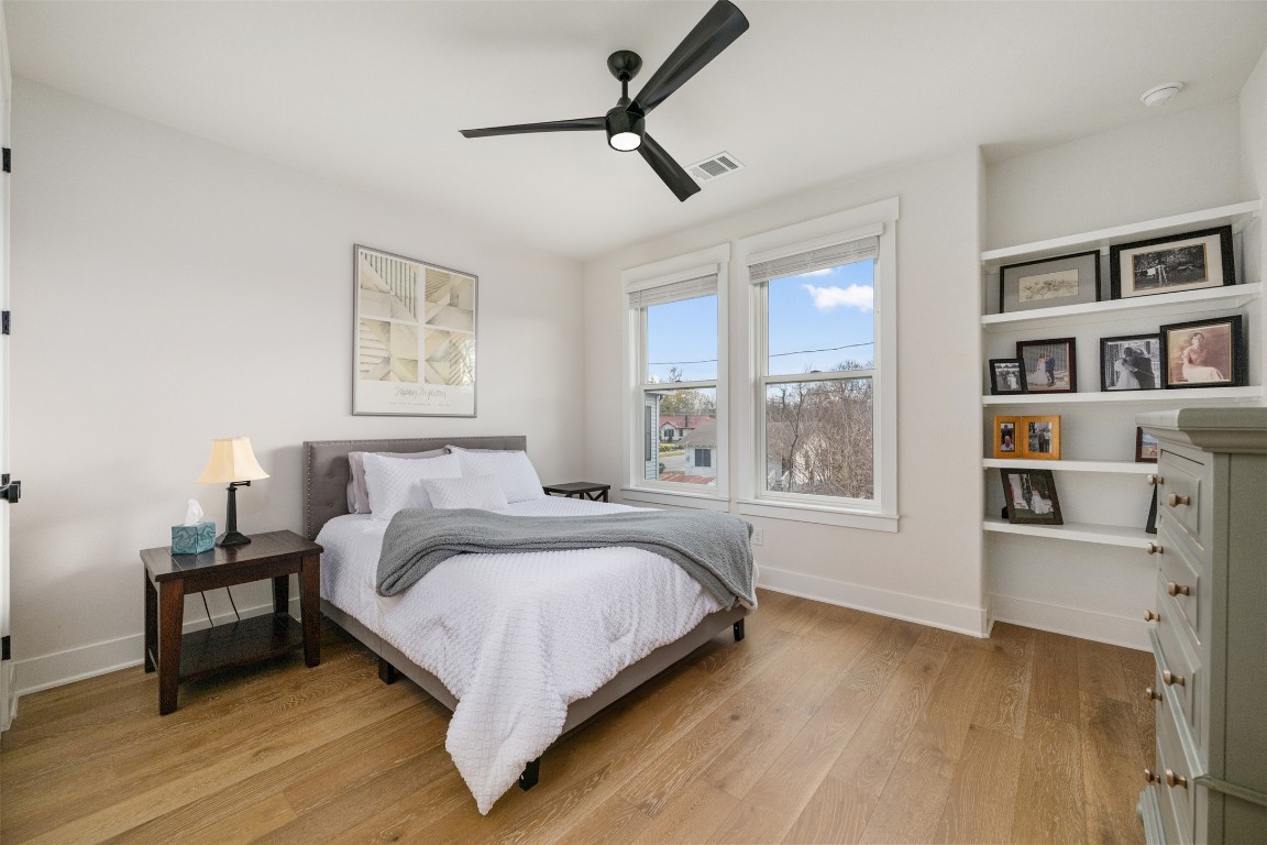 510 East 7th Street Georgetown, TX 78626 - Photo 34 of 40 a bedroom with a bed furniture and a window