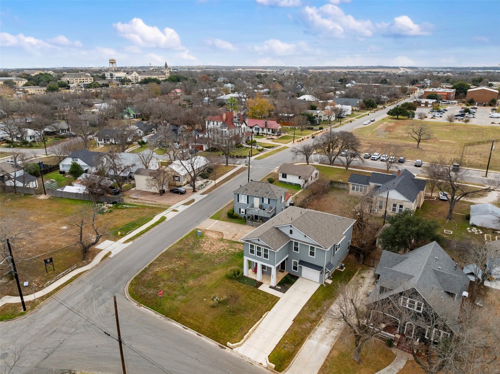 510 East 7th Street Georgetown, TX 78626 - Photo 40 of 40 an aerial view of a city with lake view