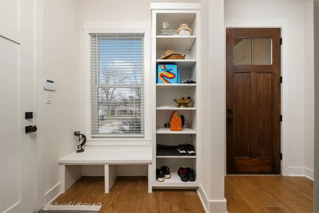 a view of a hallway with a furniture