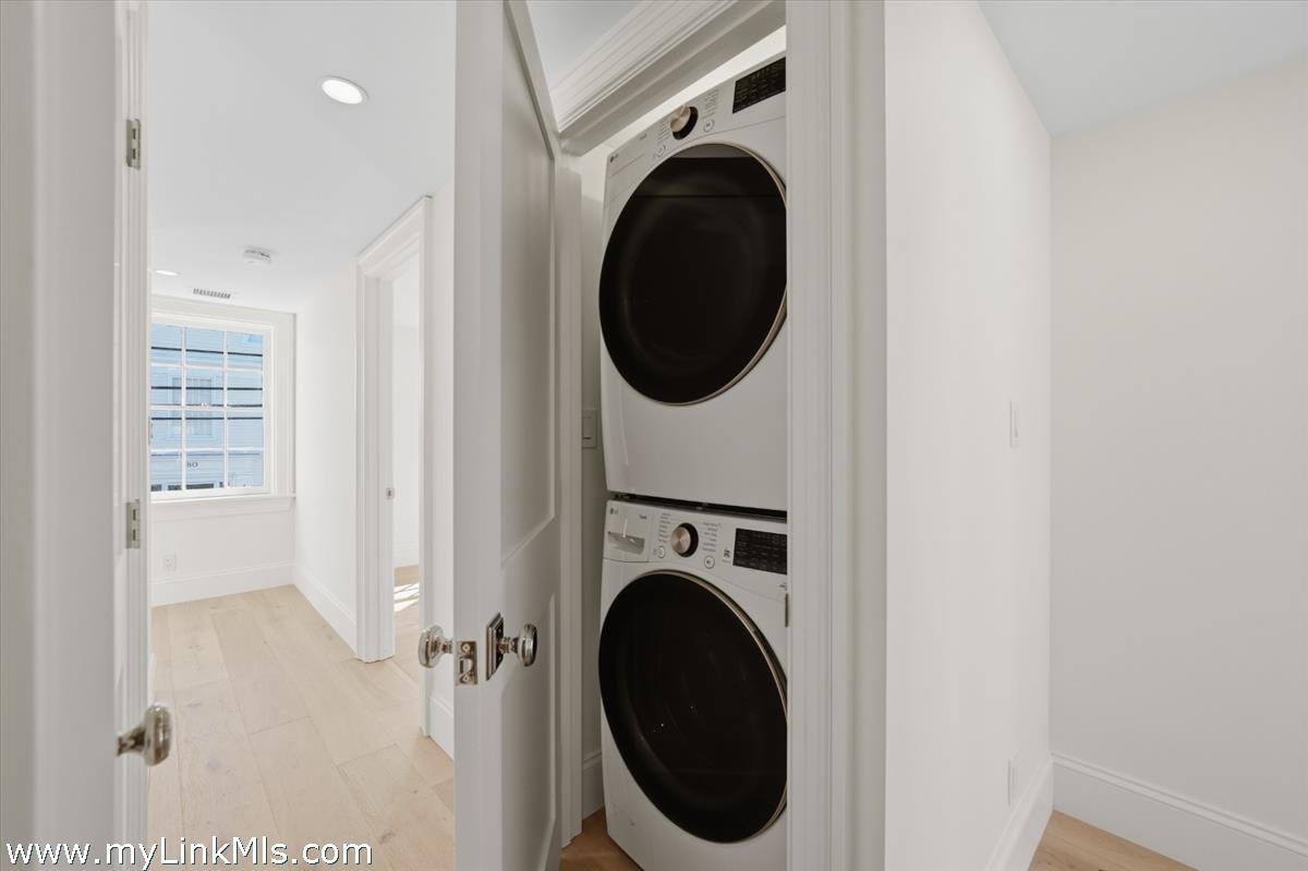 85 Orange Street Nantucket, MA 02554 - Photo 64 of 89 a close view of a utility room with dryer and washer