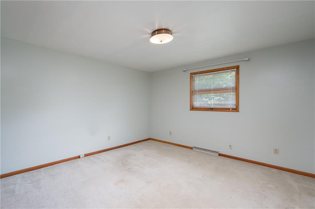 428 Glendale Road Beaver Falls, PA 15010 - Photo 13 of 25 an empty room with a window