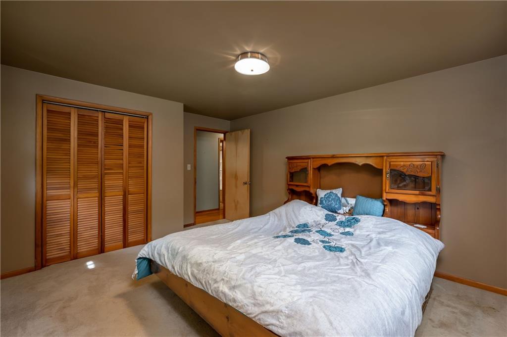 428 Glendale Road Beaver Falls, PA 15010 - Photo 16 of 25 a bed sitting in a bedroom next to a window