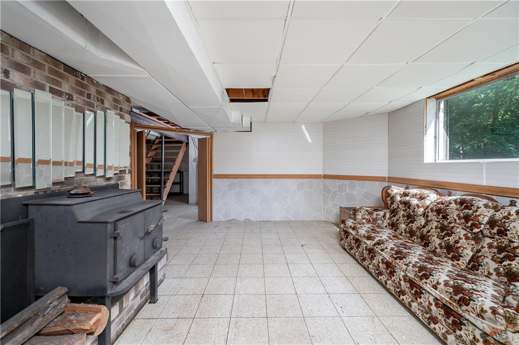 428 Glendale Road Beaver Falls, PA 15010 - Photo 21 of 25 a kitchen with stainless steel appliances granite countertop a refrigerator and a stove