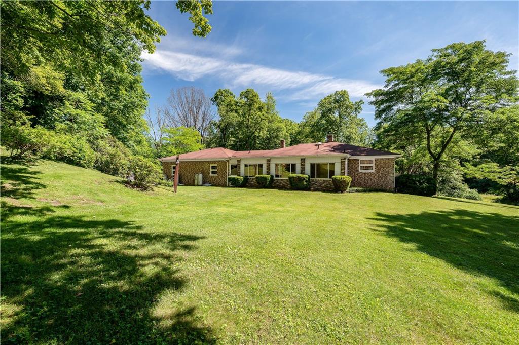 428 Glendale Road Beaver Falls, PA 15010 - Photo 25 of 25 a front view of a house with a yard