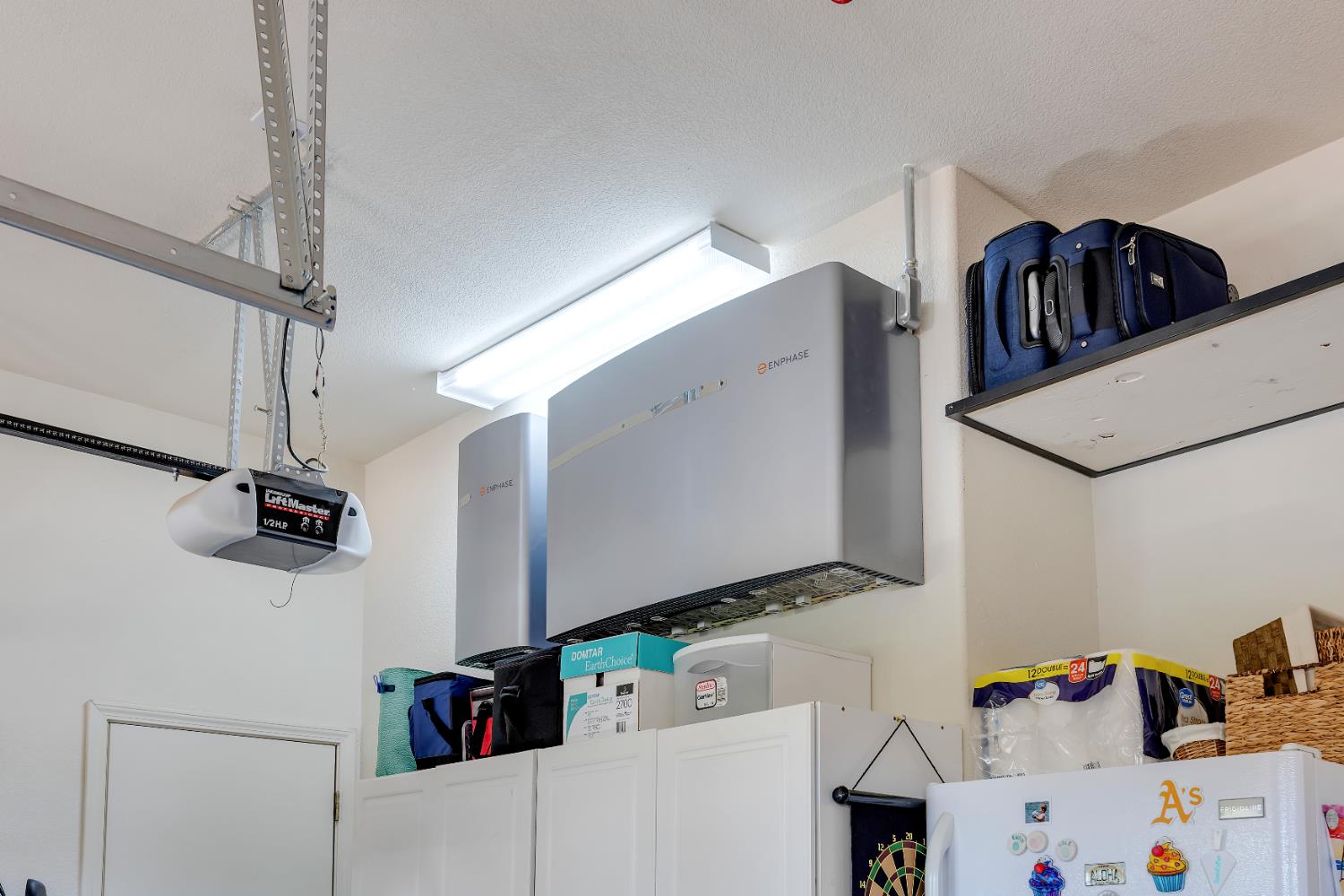 16 Rock Ridge Court, Unit 289 Copperopolis, CA 95228 - Photo 63 of 80 Backup Batteries. Shelving, Cabinets, Extra Refrigerator. Door to the exterior.