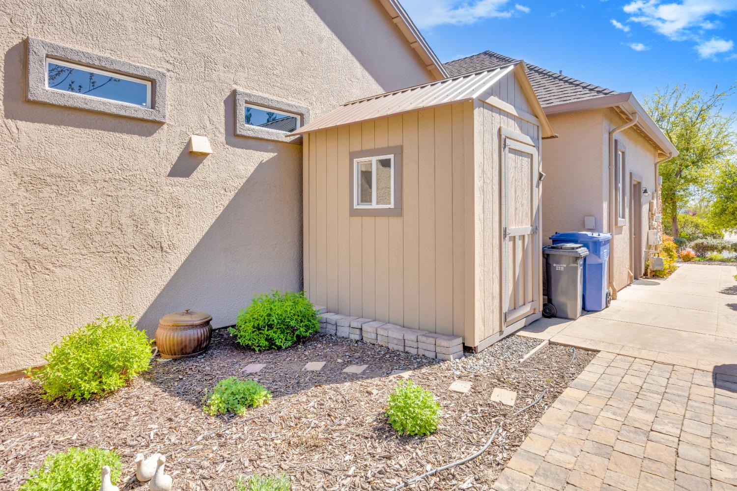 16 Rock Ridge Court, Unit 289 Copperopolis, CA 95228 - Photo 69 of 80 The right side of the property. Attached garden shed for your gardening or extra supplies.