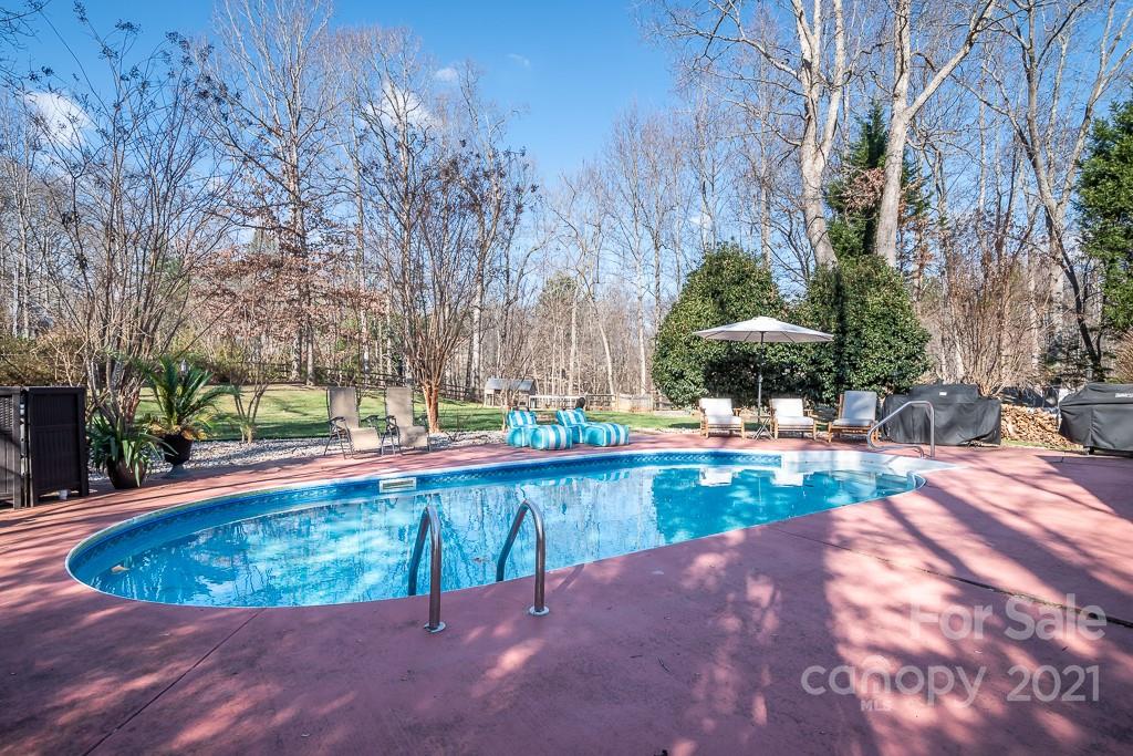 3561 Lake Shore Road South Denver, NC 28037 - Photo 22 of 29 a view of a swimming pool with a patio