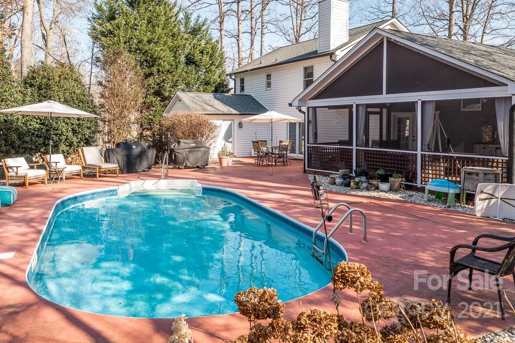 3561 Lake Shore Road South Denver, NC 28037 - Photo 23 of 29 a backyard of a house with yard and outdoor seating