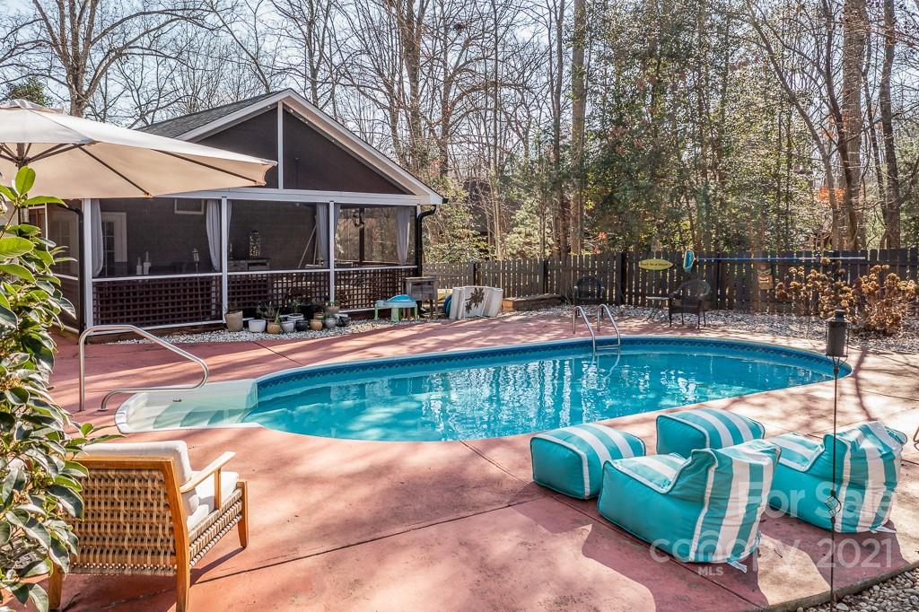 3561 Lake Shore Road South Denver, NC 28037 - Photo 24 of 29 a view of house with swimming pool and outdoor seating