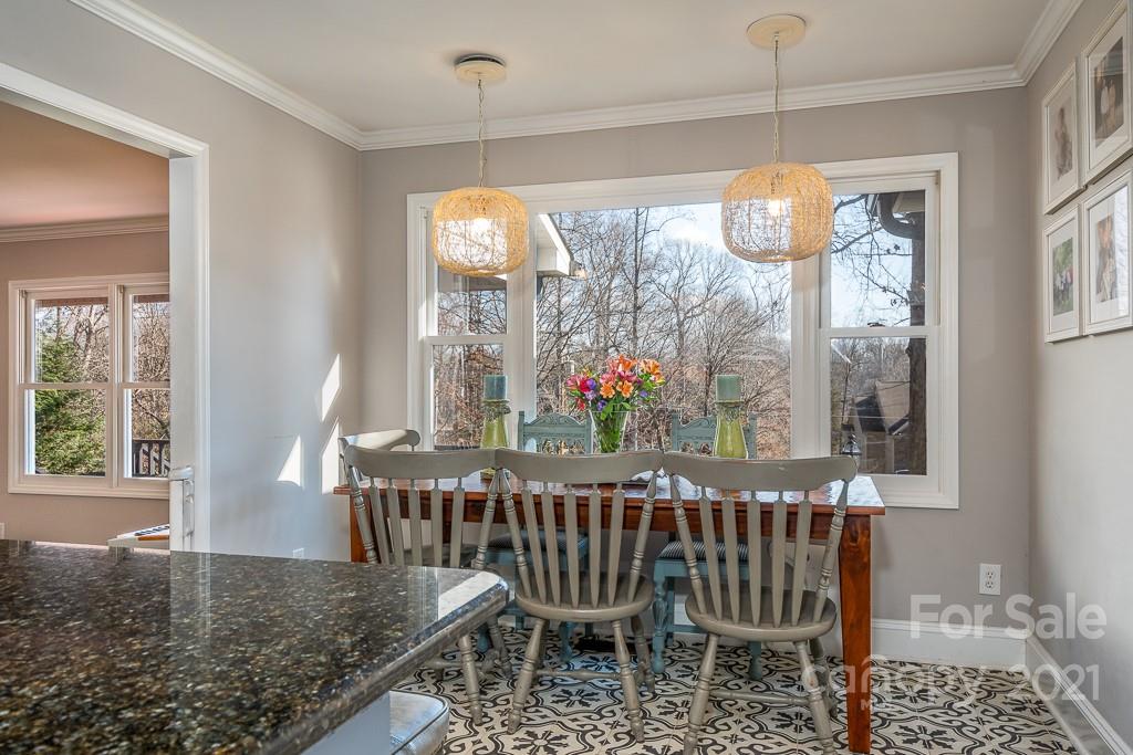 3561 Lake Shore Road South Denver, NC 28037 - Photo 8 of 29 a view of a dining room with furniture window and outside view