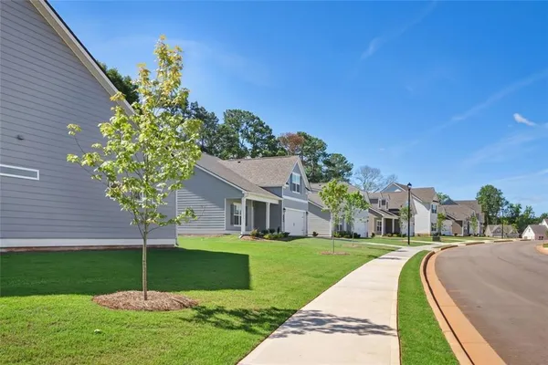 a house view with a garden space