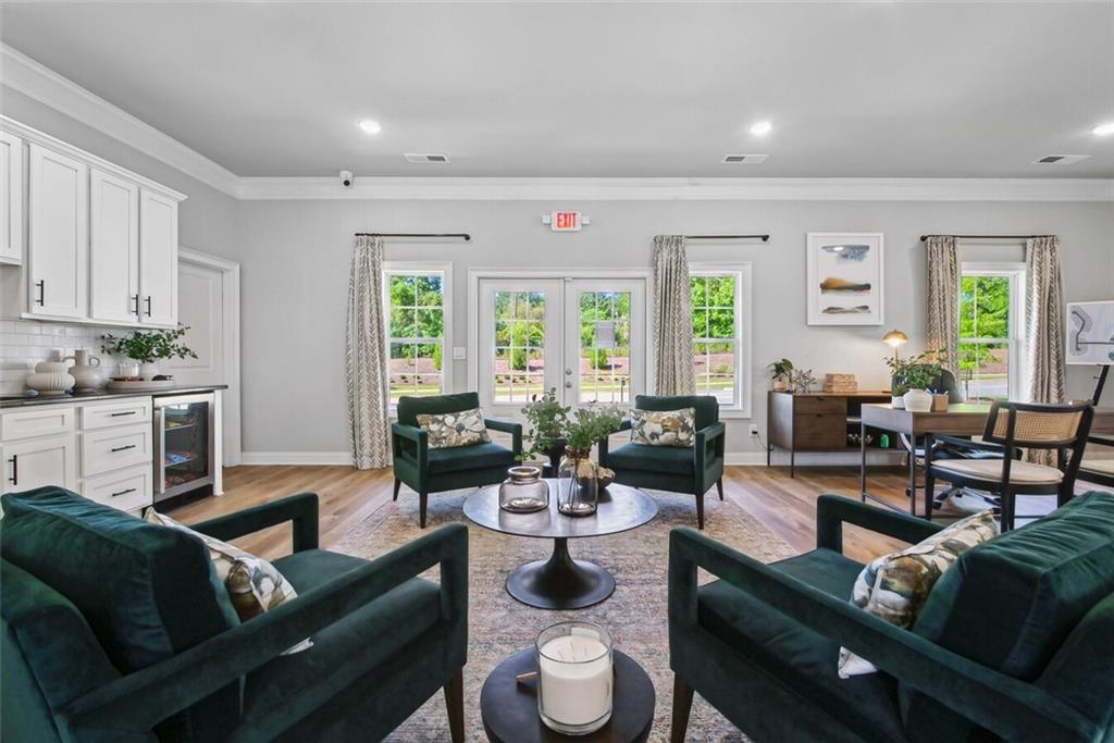 100 Agee Lane, Unit WILMONT McDonough, GA 30253 - Photo 35 of 38 a living room with furniture kitchen and a window