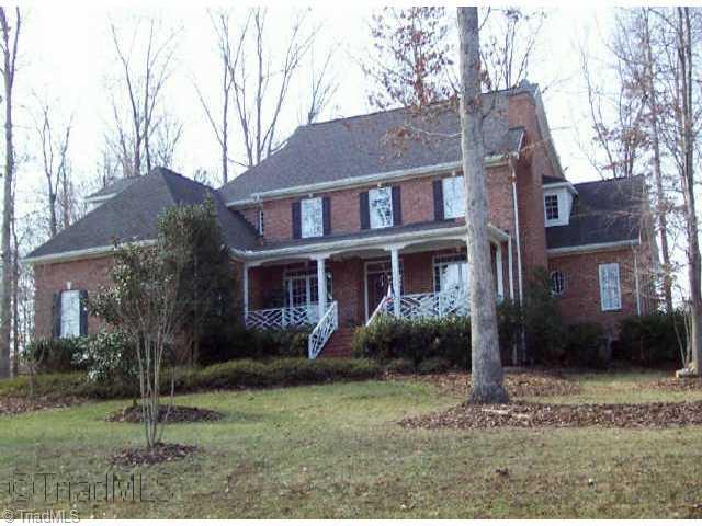 1785 Deer Run Court Oak Ridge, NC 27310 - Photo 1 of 9 Exterior Front.