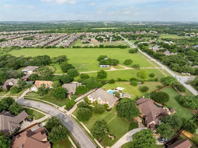 an aerial view of river residential houses with outdoor space
