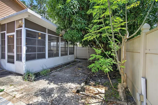 a view of a lake with a house in the background