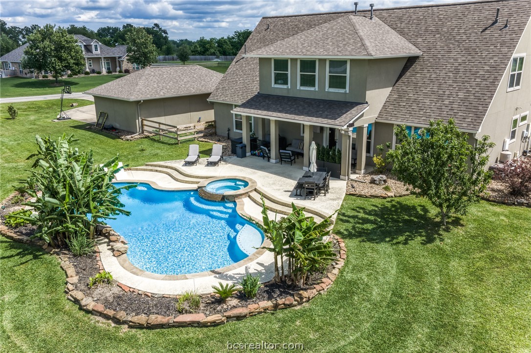586 Ruby Drive Bellville, TX 77418 - Photo 50 of 50 an aerial view of a house with outdoor space patio and mountain view