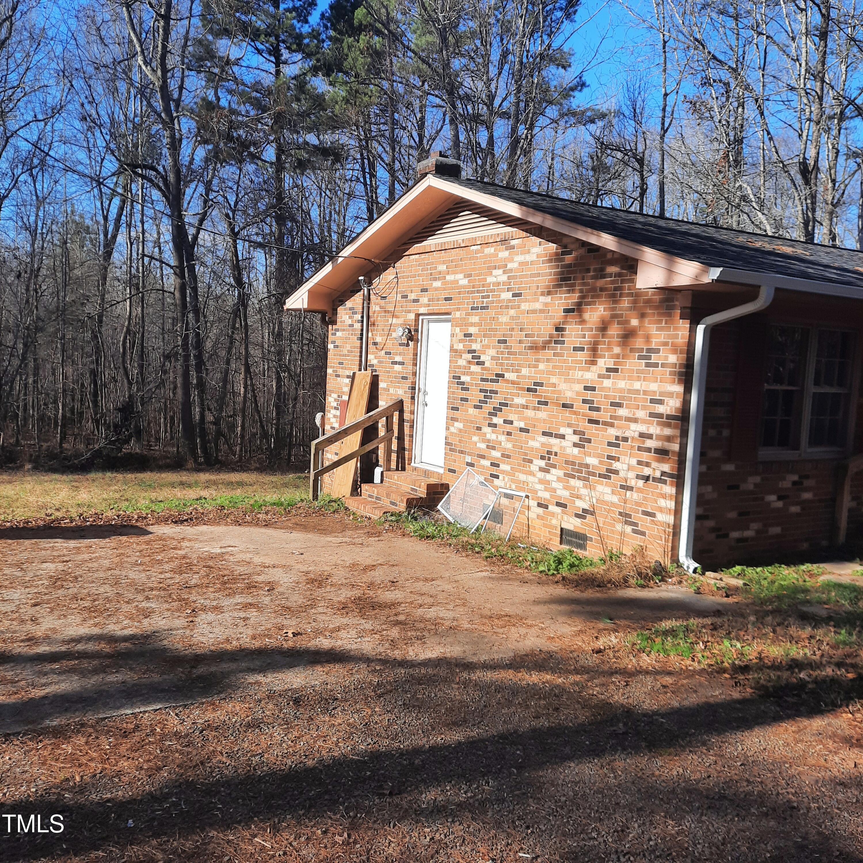 2800 Coleman Loop Road Hillsborough, NC 27278 - Photo 22 of 23 Side entry view! Great concrete pad for parking!