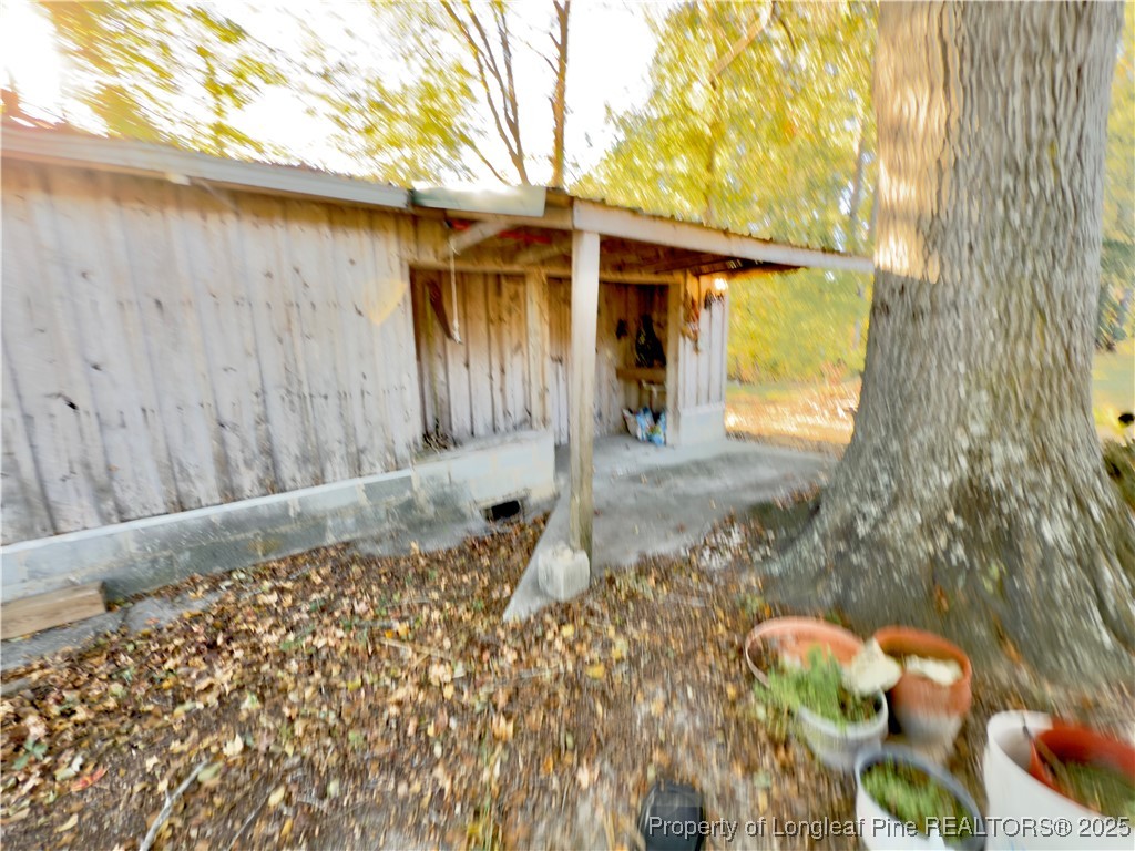 4506 Tobacco Road Orrum, NC 28369 - Photo 31 of 46 a backyard of a house