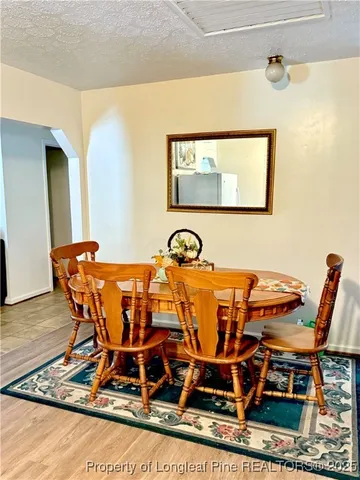 a bathroom with a sink toilet and mirror