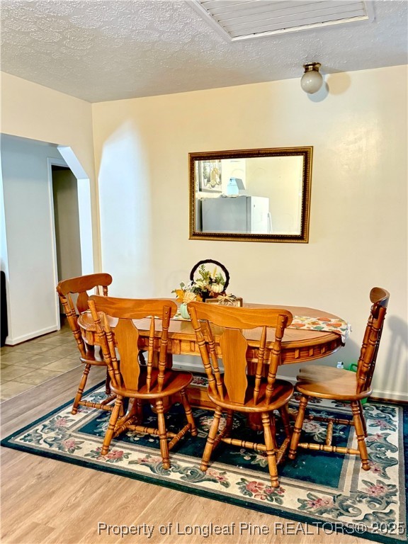 4506 Tobacco Road Orrum, NC 28369 - Photo 8 of 46 a patio with table and chairs