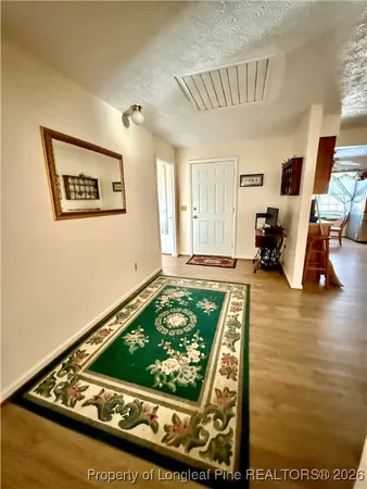 a bathroom with a sink toilet and mirror