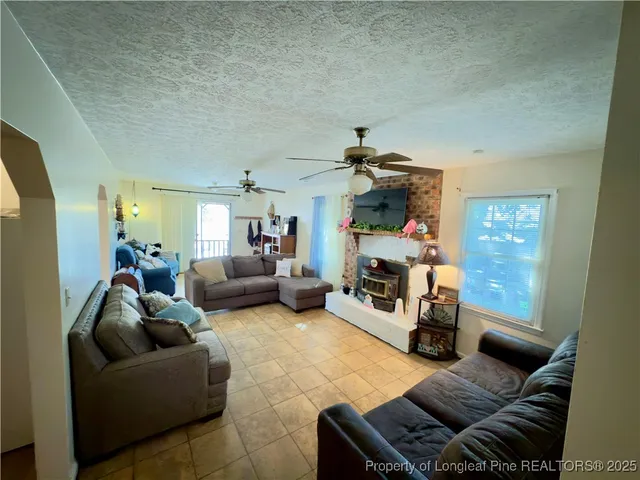 a bathroom with a toilet a sink and a mirror