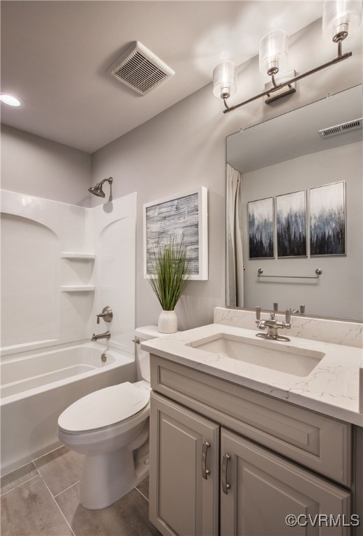 Undisclosed Address Chester, VA 23831 - Photo 16 of 32 a bathroom with a granite countertop sink a toilet a mirror and bathtub