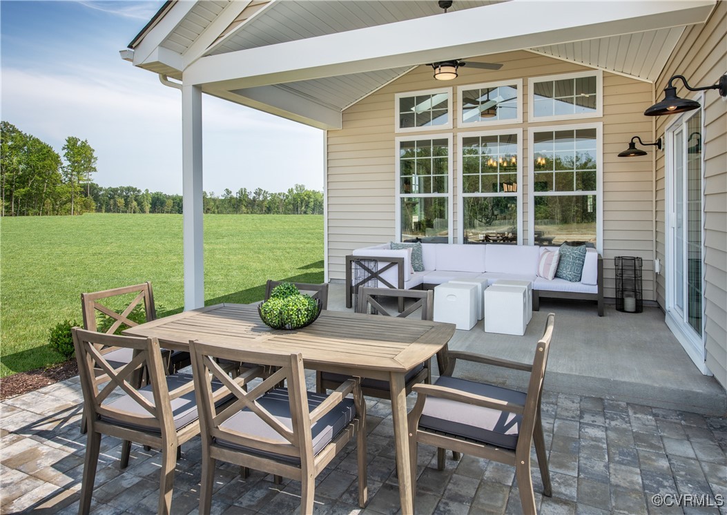 Undisclosed Address Chester, VA 23831 - Photo 17 of 32 a view of a patio with a table and chairs