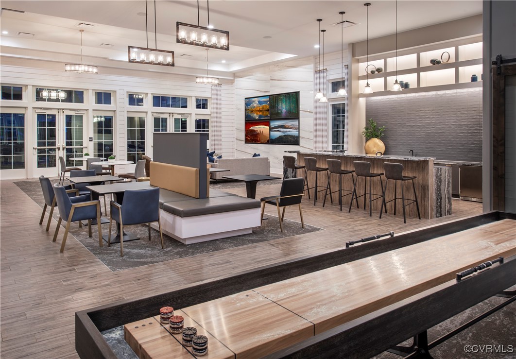 Undisclosed Address Chester, VA 23831 - Photo 22 of 32 a living room with furniture pool table and flat screen tv