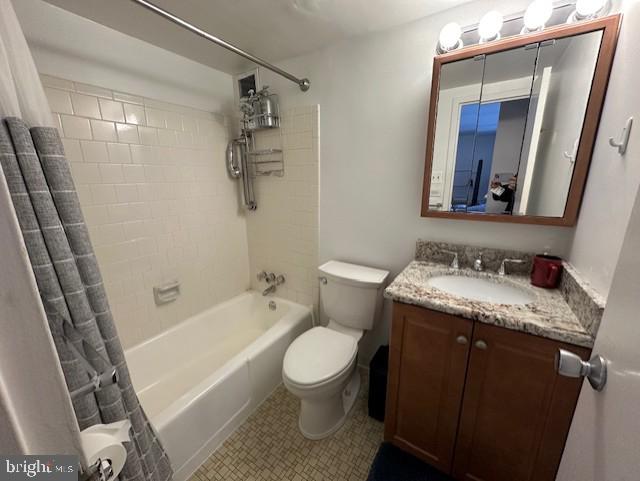 1260 21st Street Northwest, Unit 309 Washington, DC 20036 - Photo 7 of 16 a bathroom with a granite countertop sink toilet and shower