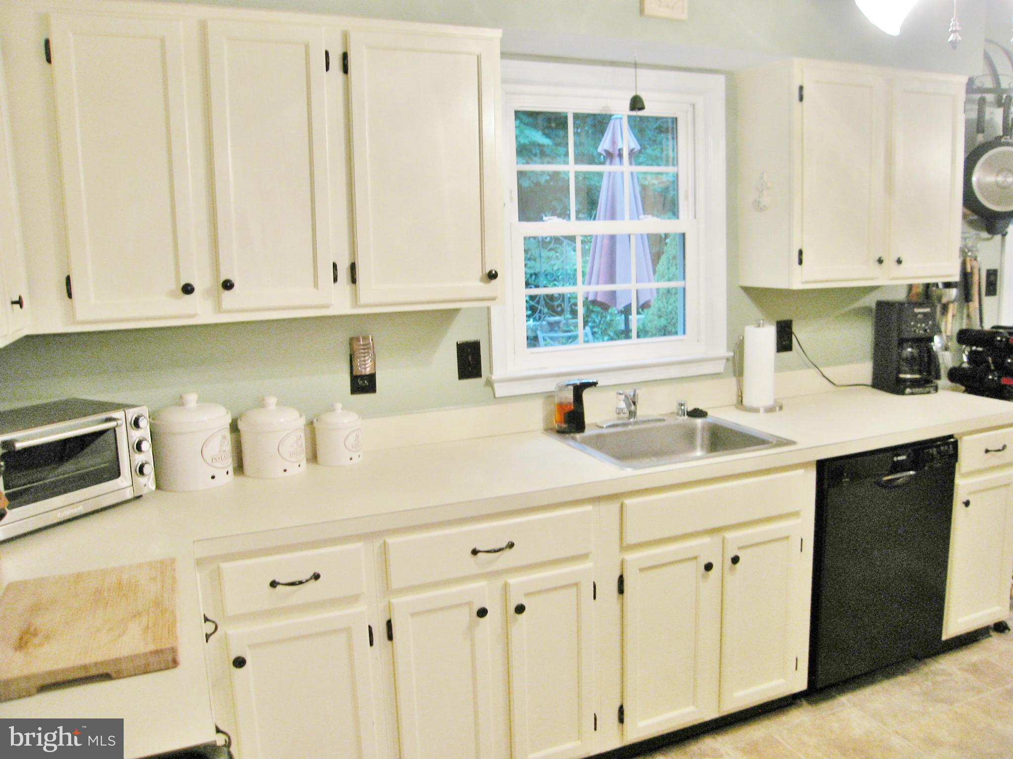 7424 Spring Tree Drive Springfield, VA 22153 - Photo 10 of 30 Kitchen w/Door to Deck Viewing Trees